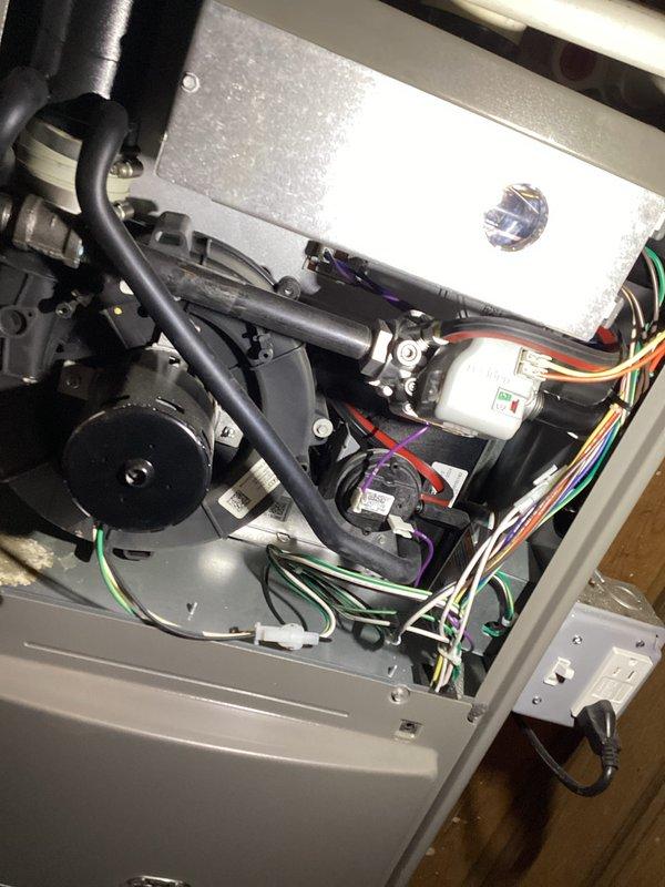 Completed recurring Air Care heating and cooling maintenance service on HVAC system. Replaced furnace filter and humidifier pad as scheduled. Performed comprehensive system inspection including internal components, blower motor assembly, electrical connections, and wiring harness. Verified gas furnace burner operation with all six burners igniting properly and producing clean blue flames, indicating proper combustion and air-to-fuel ratio. Inspected heat exchanger, gas valve assembly, and mounting hardware for proper function and secure installation. All mechanical, electrical, and control components operating within normal parameters. System tested and left in proper working condition.