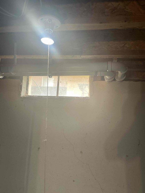 Completed full HVAC system installation including 90,000 BTU furnace and 3.5 ton air conditioning unit with rear discharge configuration in basement utility area. Obtained necessary mechanical and electrical permits prior to installation, performed all required connections and reconnections to existing infrastructure, and ensured proper integration with utility services for rebate processing eligibility.