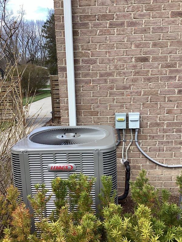 Completed installation of 4-ton Lennox air conditioning system with matching evaporator coil. Secured mechanical and electrical permits, positioned outdoor condensing unit against exterior wall with proper clearances, installed refrigerant line set with insulation, established electrical disconnect and power connections, and evacuated system to 387 microns to verify leak-free installation. System tested and operational upon completion.