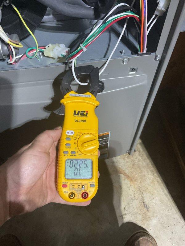 Completed annual heating maintenance on furnace system per membership agreement. Performed comprehensive tune-up including electrical diagnostics using digital clamp meter to verify amp draw and voltage readings at gas valve assembly and control board connections. All electrical measurements within manufacturer specifications. Inspected and tested all system components, wiring connections, and safety controls. System operating properly with no issues found.