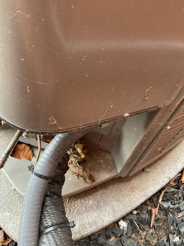 Completed routine Air Care Cooling maintenance inspection on HVAC system. System pressures and temperatures were measured and found to be within normal operating parameters, with low side reading 99.7 PSIG at 18.5°F and high side reading 211.2 PSIG at 87°F. Minor debris accumulation was observed around the base of the equipment requiring attention during future service visits.