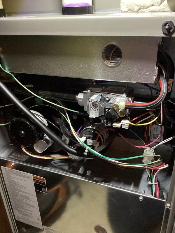 Completed scheduled Air Care Heating and Cooling maintenance on furnace unit. Replaced furnace filter and humidifier pad as requested. Performed comprehensive system inspection including gas valve assembly, blower motor, electrical connections, and all internal components. All wiring connections verified secure, system operational and functioning within normal parameters.
