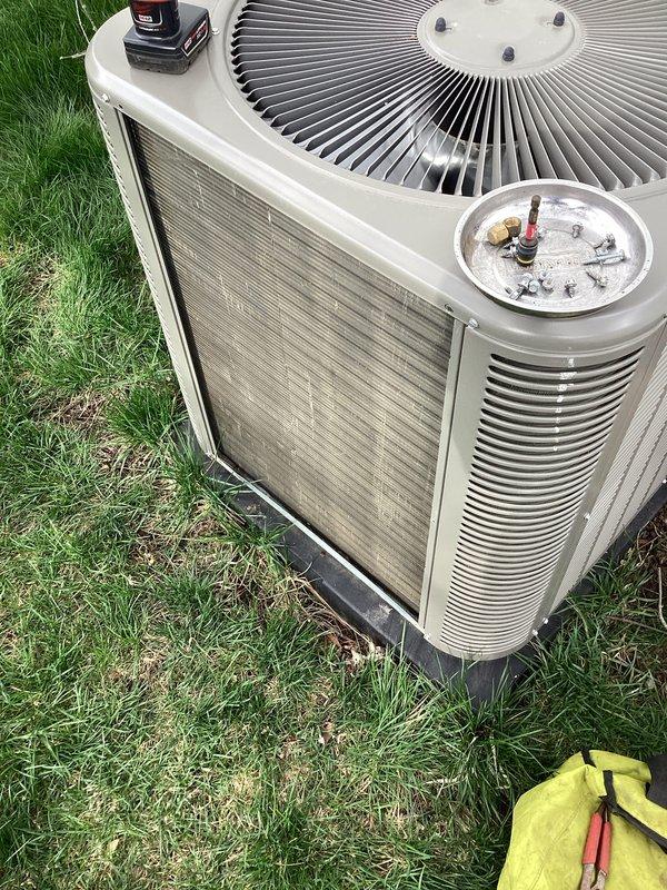 Responded to service call for GFI tripping issue on 2-year-old HVAC system located in basement. Performed diagnostic troubleshooting to identify electrical fault causing ground fault circuit interruption. Completed annual cooling maintenance (ACM) on Bryant outdoor condenser unit, including inspection of fan motor assembly, capacitor testing, refrigerant level verification, and cleaning of condenser coils. Resolved GFI tripping concern and verified system operation under normal load conditions. Both equipment warranty and labor warranty apply to completed repairs.