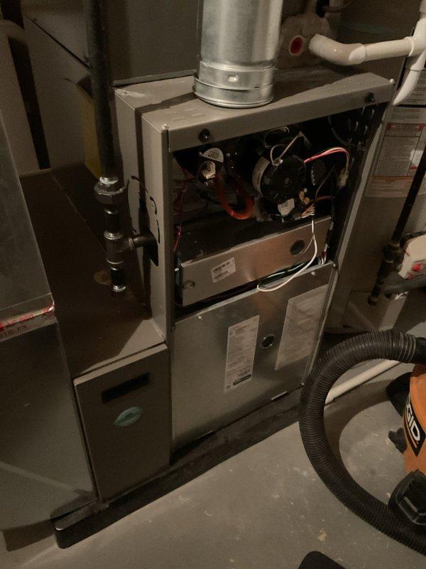 Completed annual furnace maintenance and tune-up on residential Lennox heating system. Unit was found operating properly upon arrival. Performed comprehensive inspection of all internal components including blower motor, capacitor, flame sensors, ignition system, and control board. Verified all electrical connections were secure, checked wiring integrity throughout the unit, and tested safety controls. Inspected heat exchanger, burner assembly, and combustion chamber for proper operation. Confirmed adequate airflow through ductwork and filter cabinet. All components functioning within normal parameters. System left in proper working order with no deficiencies noted.