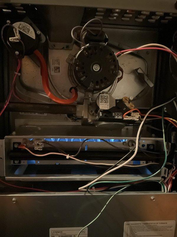 Completed annual furnace maintenance and tune-up on residential Lennox heating system. Unit was found operating properly upon arrival. Performed comprehensive inspection of all internal components including blower motor, capacitor, flame sensors, ignition system, and control board. Verified all electrical connections were secure, checked wiring integrity throughout the unit, and tested safety controls. Inspected heat exchanger, burner assembly, and combustion chamber for proper operation. Confirmed adequate airflow through ductwork and filter cabinet. All components functioning within normal parameters. System left in proper working order with no deficiencies noted.