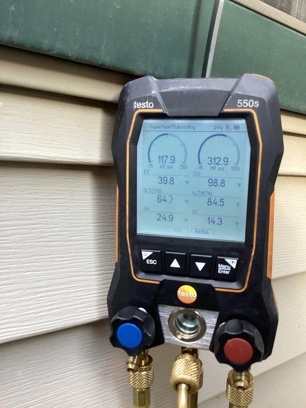 Completed annual cooling maintenance on residential split system air conditioning unit. Performed comprehensive system diagnostics using digital manifold gauges, recording refrigerant pressures and temperatures across the system. Inspected condensing unit exterior, noting heavy soiling on cabinet panels, and checked all electrical connections, refrigerant lines, and operational components. Customer was advised that filters and evaporator pads require replacement at this time to maintain optimal system performance and indoor air quality.