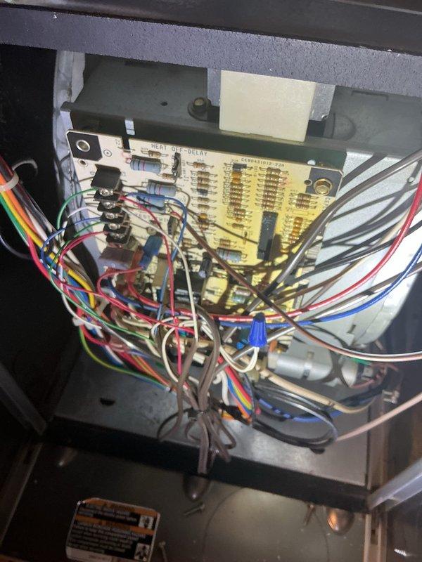 Completed annual preventative maintenance on 8-year-old residential air conditioning system. Performed comprehensive inspection of outdoor condensing unit and indoor air handler components. Checked electrical connections at control board, verified proper wire terminations, and inspected capacitor and relay functions. Measured voltage and amperage draw on compressor and condenser fan motor using clamp meter to ensure equipment operating within manufacturer specifications. Cleaned condenser coils, checked refrigerant pressures, and verified proper system operation. Changed air filter and lubricated blower motor bearings as needed. Inspected condensate drain line for proper flow and cleared any restrictions. Tested thermostat calibration and cycling functions. All components found operating normally with no issues detected. System running efficiently and ready for upcoming cooling season.