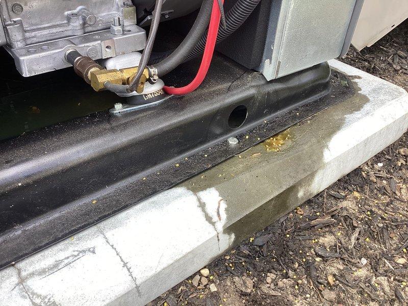 # Generator Maintenance and Air Care Cooling Service

Completed routine preventive maintenance on standby generator system and associated HVAC equipment. Performed comprehensive inspection of generator compartment, identifying fluid accumulation in equipment housing with debris present. Documented condition of mechanical components including mounting brackets, fittings, and corrugated conduit connections. All brass fittings and aluminum mounting hardware were inspected for proper security and signs of wear.

Conducted Air Care Cooling service on outdoor HVAC unit positioned on concrete pad with integrated drain pan system. Inspected condensate drainage system, noting moisture accumulation and algae growth in pan recesses. Examined gas line connections, valve assemblies, and associated hardware for proper operation and security. Verified drain pan positioning and functionality for proper condensate management. All mechanical connections, including corrugated hoses and line sets, were as