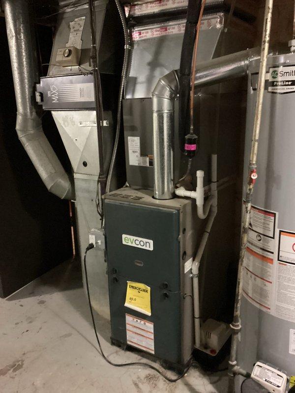 Completed scheduled HVAC maintenance on residential Evcon furnace and air handler system. Performed routine Air Care Heating and Cooling service including filter replacement and evaporator pad inspection. All equipment operating within normal parameters, no issues identified during inspection.