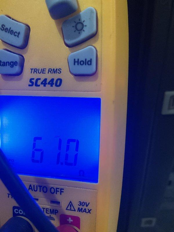Completed annual HVAC maintenance (AHM) on air handling unit. Performed comprehensive system inspection, verified all electrical connections and components were functioning properly, and measured system voltage reading at 6.10V on motor assembly. Documented internal unit condition with photos showing blower motor, control board wiring, and electrical components in good operating condition.