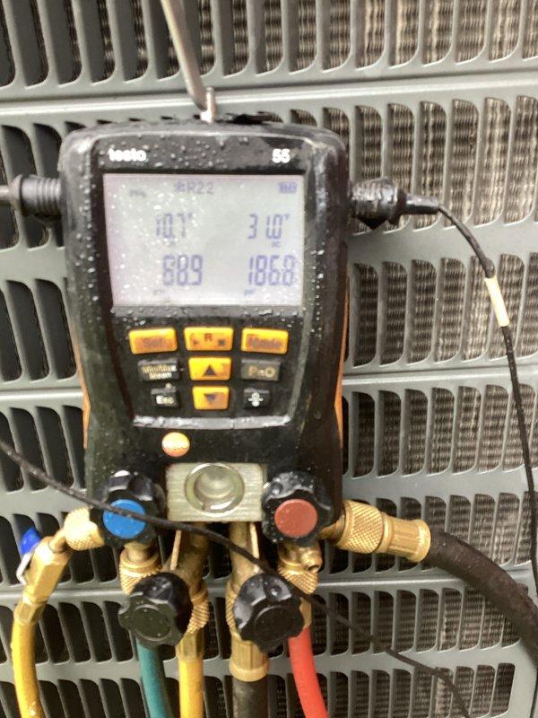 Completed annual cooling maintenance on residential heat pump system. Performed system diagnostics using digital manifold gauges to verify refrigerant pressures and temperatures, confirming proper system operation. Inspected outdoor condenser unit, noting accumulated debris on exterior panels and coil surfaces requiring attention during future service. Replaced air filters as needed per maintenance protocol.