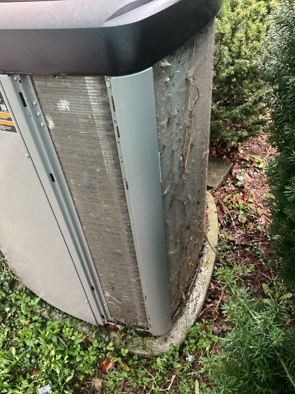 Completed annual cooling maintenance on residential air conditioning system. Accessed outdoor condenser unit and inspected all major components including compressor, capacitor, control board, and refrigerant lines. Cleaned condenser coils which showed significant accumulation of dirt, debris, and organic matter on aluminum fins. Verified electrical connections and wiring throughout system, checked capacitor operation, and inspected copper refrigerant tubing for proper condition. All components found operational and system ready for cooling season.