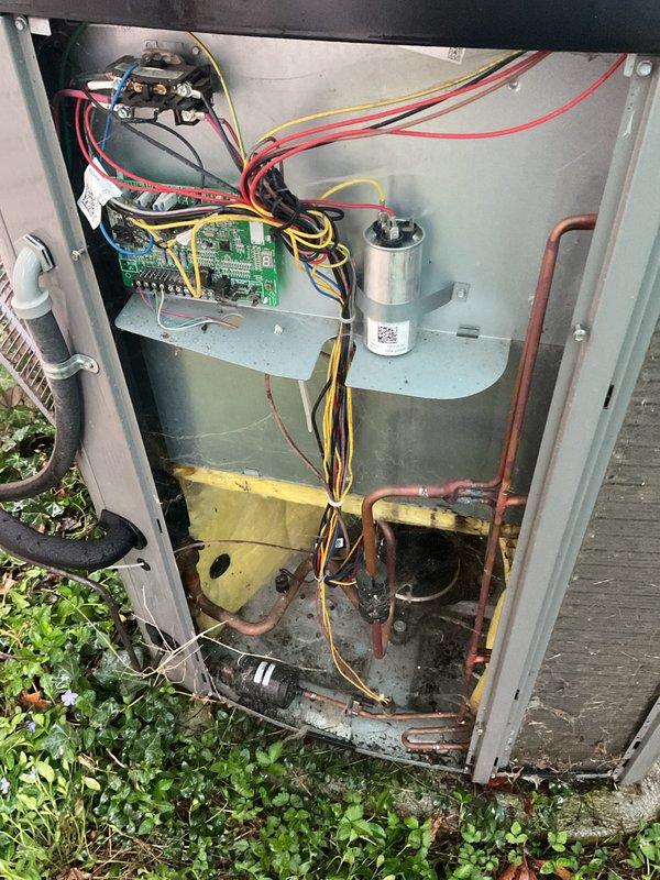 Completed annual cooling maintenance on residential air conditioning system. Accessed outdoor condenser unit and inspected all major components including compressor, capacitor, control board, and refrigerant lines. Cleaned condenser coils which showed significant accumulation of dirt, debris, and organic matter on aluminum fins. Verified electrical connections and wiring throughout system, checked capacitor operation, and inspected copper refrigerant tubing for proper condition. All components found operational and system ready for cooling season.