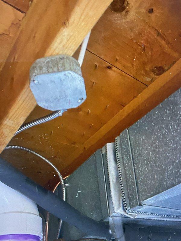 Responded to installation callback to address electrical code violation on 4-month-old furnace system located in basement. Corrected MC cable securing issue by installing proper fasteners within 12 inches of junction box as required by code. Verified furnace operation, confirmed heating functionality, and ensured all electrical connections meet current code compliance standards.