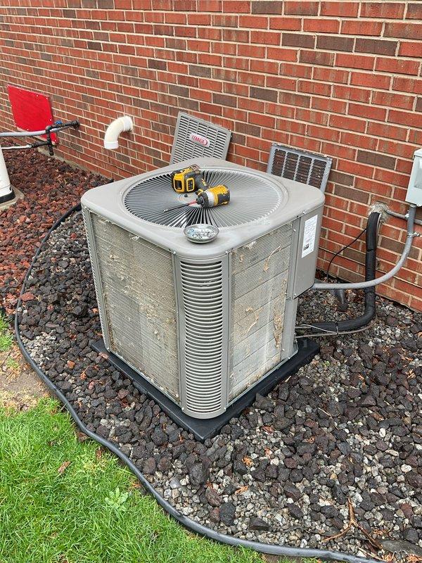 # HVAC Maintenance Service Completed

Performed comprehensive ComfortGuard maintenance package on residential heating and cooling system. Conducted thorough inspection of gas furnace internal components, including gas valve assembly, blower motor, electrical connections, and control board. Verified all wire connections were secure and properly routed throughout the cabinet. Examined ignition system and safety controls for proper operation.

Replaced furnace air filter as specified in maintenance package. Installed new humidifier pad to ensure optimal humidity control and system performance during heating season. Inspected humidifier water supply and drainage for proper function.

Proceeded to outdoor condensing unit and performed exterior equipment inspection. Examined condenser housing, fan assembly, and electrical disconnect box. Verified unit was level on mounting pad and all external connections were secure. Checked refrigerant line insulation and condensate drainage system includi