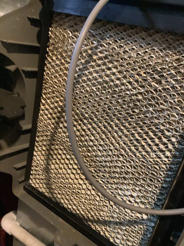 Completed scheduled Air Care Maintenance on residential cooling system. Performed comprehensive inspection of evaporator coil, which showed clean condition with intact honeycomb mesh surface and properly routed refrigerant lines. Verified system temperatures using calibrated digital thermometer, recording evaporator coil temperature of -7.5°C, indicating proper refrigerant charge and normal cooling operation. All components inspected and found operating within manufacturer specifications.