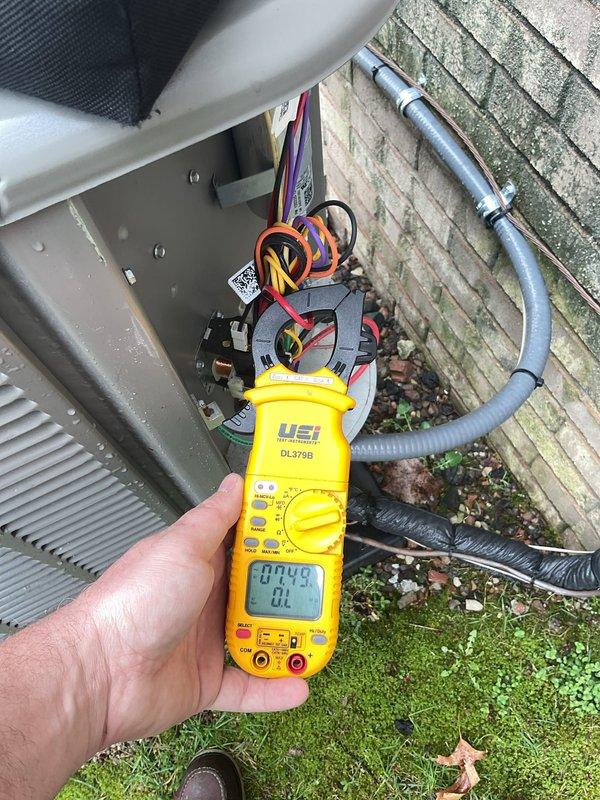 # HVAC Maintenance - ACM Completed

Performed routine Air Care Maintenance on residential air conditioning system. Conducted electrical diagnostics at outdoor unit disconnect box using digital multimeter to verify proper voltage and amperage readings. All electrical connections tested and confirmed within normal operating parameters, ensuring safe and efficient system operation.
