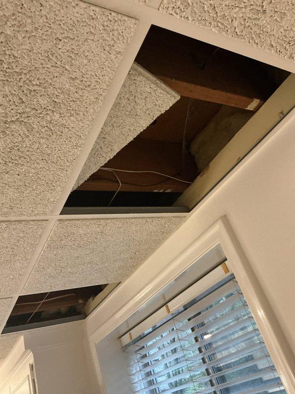 Responded to communication failure between furnace and air conditioning unit on new installation. Accessed attic space through ceiling opening and ran new control wiring from furnace to outdoor AC unit to establish proper communication between systems. Routed wire through existing attic infrastructure alongside HVAC ductwork and secured appropriately. Verified system communication restored and both units operating correctly upon completion.