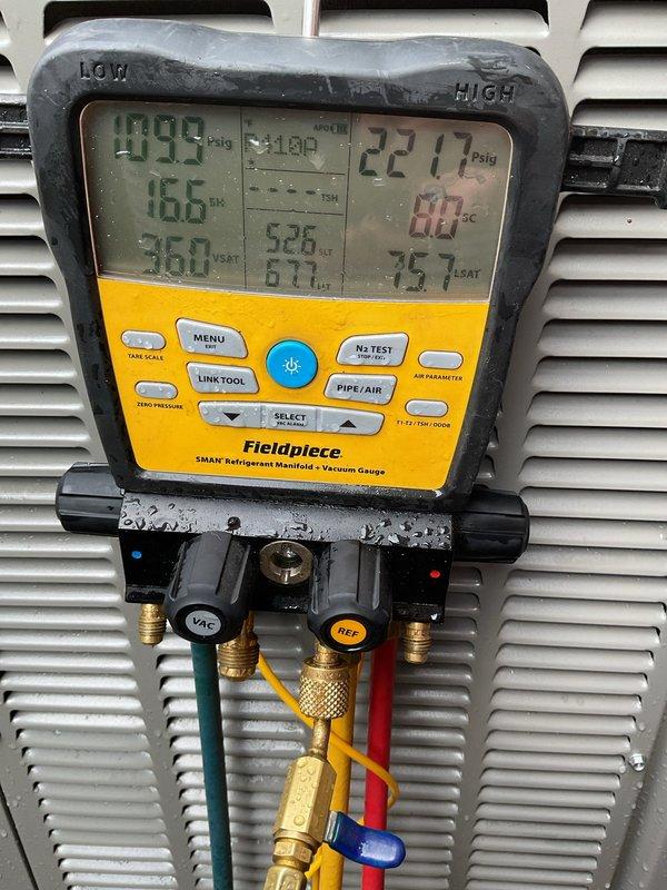 Completed scheduled Air Care Maintenance on residential cooling system. Performed comprehensive system diagnostics using refrigerant manifold gauge set, recording operating pressures and temperatures on both high and low sides of the system. Inspected outdoor condenser unit, noting accumulation of debris on coil fins and minor weathering on cabinet exterior. All refrigerant pressures and superheat/subcooling readings found within manufacturer specifications, confirming proper system charge and operation. Documented equipment condition with photos for maintenance records.