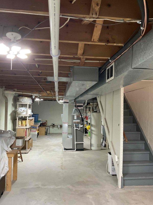 Completed full HVAC system installation in basement location, including Lennox 70,000 BTU gas furnace (model CK40CT-24B-71) and 2-ton air conditioning unit with rear discharge configuration. Installed new ductwork, PVC condensate drainage, and electrical connections, reconnecting all existing utilities to new equipment. All permits obtained and installation performed to code specifications, with system fully operational and tested upon completion.