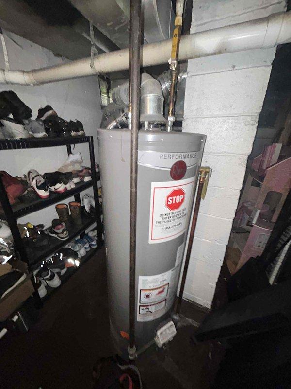 Conducted on-site evaluation for new air conditioning system installation at residential property currently without existing AC equipment. Assessed basement mechanical room containing furnace/air handler unit with existing ductwork infrastructure, including flexible and insulated ducting with metal plenum connections. Evaluated utility area layout, existing HVAC components, and available space for proposed AC condenser and associated refrigerant line routing to determine optimal system configuration and installation requirements for complete estimate preparation.