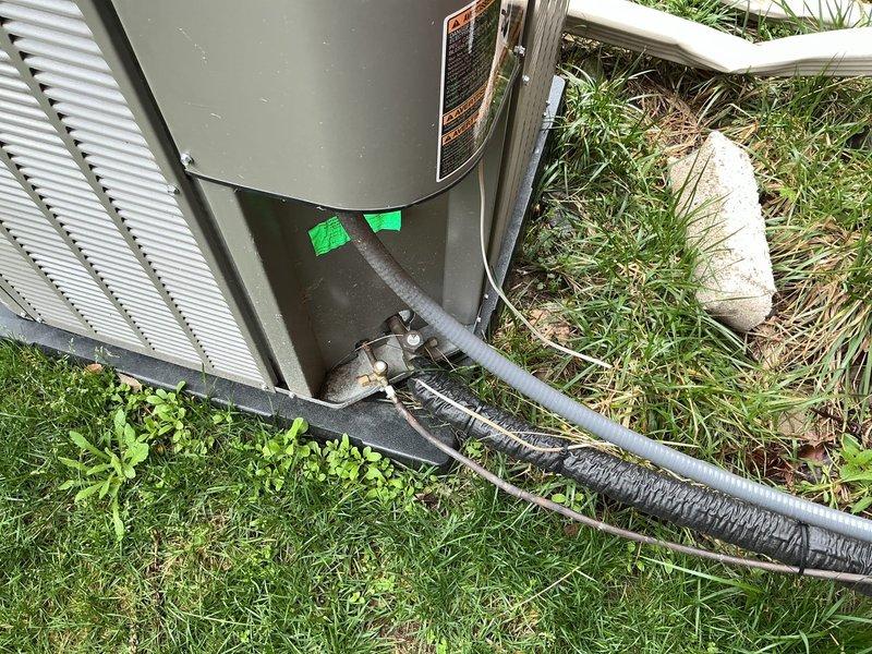 Responded to no cooling complaint on 4-year-old system. Customer reported lawn care crew damaged wiring, resulting in loss of cooling function while heating remained operational. Upon inspection, located severed low-voltage control wire running from outdoor condensing unit to indoor air handler. Repaired damaged conductor, verified proper voltage at thermostat and equipment terminals, and restored system to full cooling operation. Tested both heating and cooling modes to confirm complete functionality.