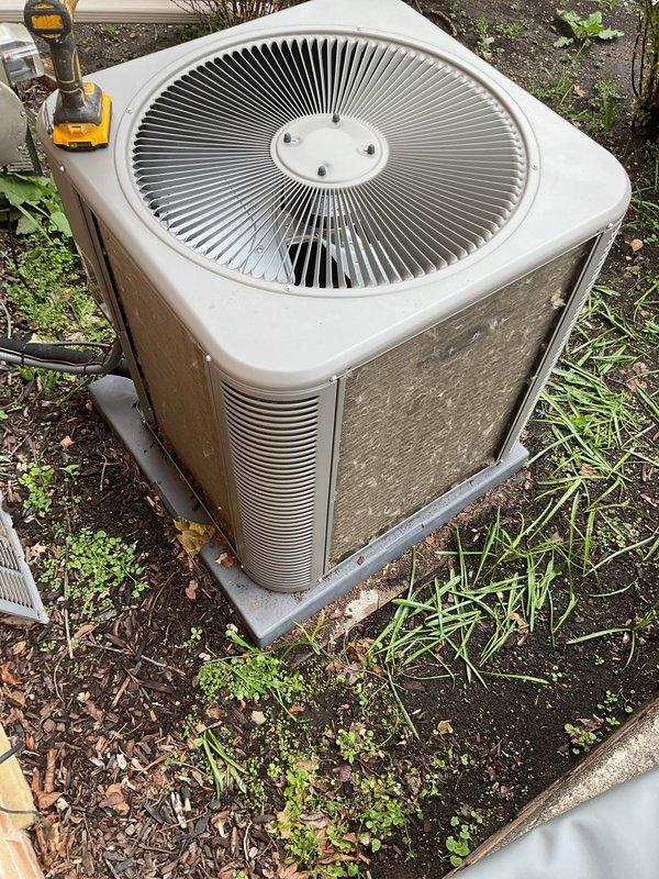 Completed comprehensive preventive maintenance and tune-up on residential air conditioning system in preparation for summer cooling season. Performed thorough inspection of outdoor condenser unit, including cleaning of exterior panels, louvers, and mesh screening which showed accumulated dirt and debris. Verified proper fan operation, checked refrigerant levels, inspected electrical connections, and tested system performance. Unit confirmed to be in good working order with no issues identified. All components functioning within normal operating parameters.