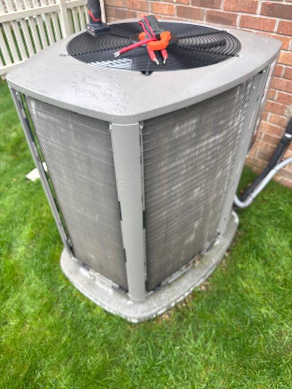 Performed annual cooling maintenance on residential air conditioning system. Completed comprehensive inspection of outdoor condensing unit, verified electrical connections, tested system operation and performance, and documented equipment condition with diagnostic measurements. Unit operating within normal parameters upon service completion.