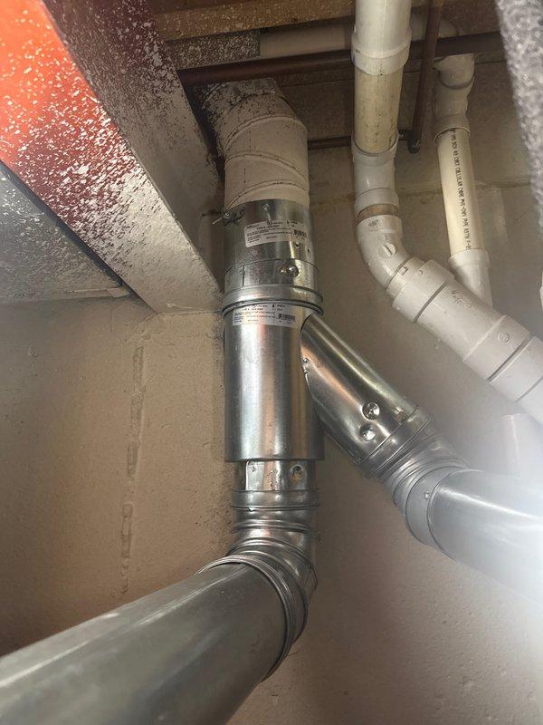 Completed full HVAC system installation including a 70,000 BTU Lennox furnace and 2-ton air conditioning unit with rear discharge configuration. Installed new ductwork with metallic rigid pipes and flexible ducting connections, along with PVC ventilation piping and inline ventilation components. All mechanical and electrical connections were completed, equipment was reconnected and tested for proper operation, and necessary permits were obtained for the installation.