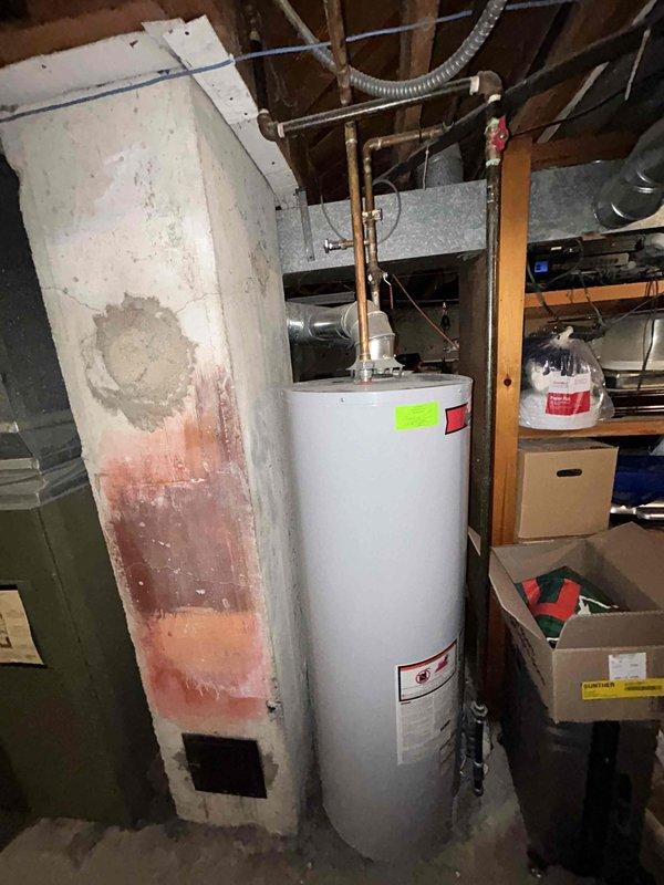 Provided estimate for complete HVAC system replacement in basement location. Existing 20+ year old furnace and air conditioning system non-operational, utilizing obsolete R-22 refrigerant. Assessment documented aging equipment showing significant deterioration including visible rust and corrosion on cabinet surfaces, indicating end of serviceable life and need for full system replacement rather than repair.