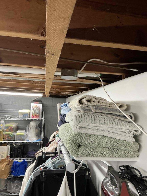 Completed on-site evaluation for new air conditioning system installation at residential property. Assessed garage-mounted indoor air handler location and exterior condensing unit placement, documented existing ductwork configuration and electrical requirements. Provided comprehensive equipment replacement estimate for complete HVAC system installation.