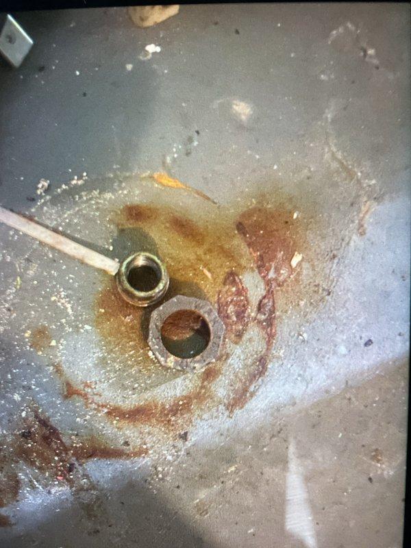 Responded to callback for gas odor reported following same-day installation of 50-gallon hot water heater. Upon arrival, performed comprehensive leak detection inspection of all gas connections, including supply line, gas valve, and burner assembly connections. Verified proper burner operation and flame characteristics, confirming normal blue flame with orange tips and no irregular combustion patterns. Inspected installation quality, including gas piping connections, venting, and appliance positioning. Used leak detection solution on all threaded connections and union fittings with negative results. Monitored unit through complete heating cycle to ensure safe operation. Documented unit operating normally with no gas leaks detected at time of callback inspection. Addressed customer concerns and provided operational overview of new water heater.