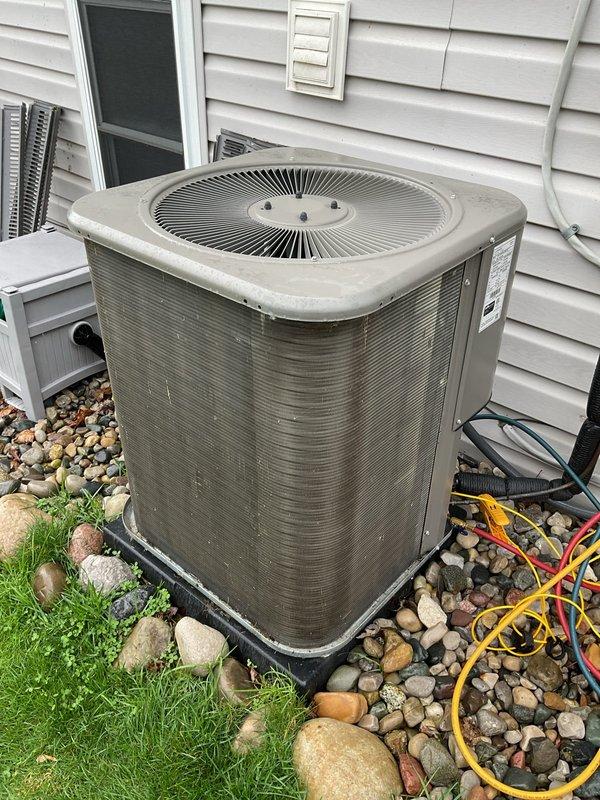 Completed comprehensive ComfortGuard maintenance package on residential split HVAC system, including full inspection of gas furnace with blower assembly and outdoor condensing unit. Performed standard preventive maintenance procedures, verified proper operation of all mechanical and electrical components, and documented system condition with access panel removed for thorough internal assessment.