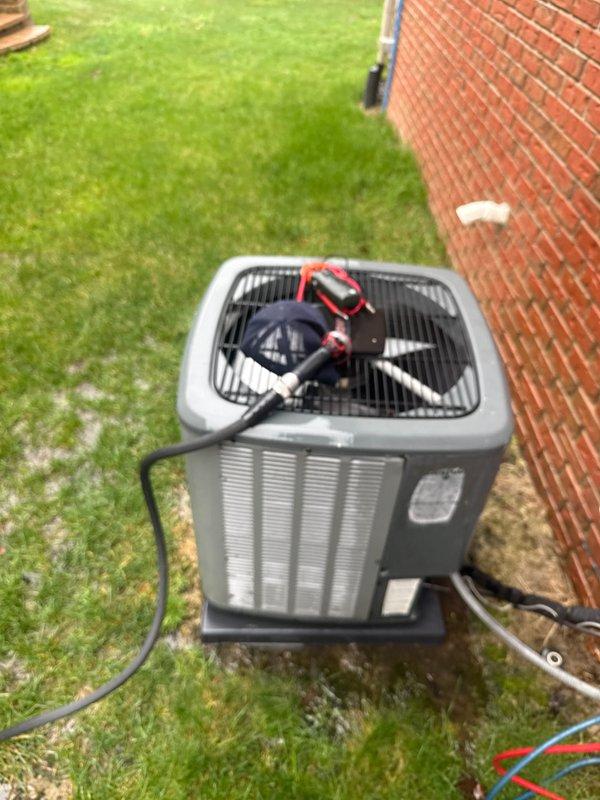Completed annual cooling maintenance on residential air conditioning system. Performed comprehensive inspection of outdoor condensing unit, verified proper operation of all components, checked refrigerant lines and electrical connections, and tested system performance with diagnostic equipment. No air filters required at this time, and residential annual contract was processed during the visit.