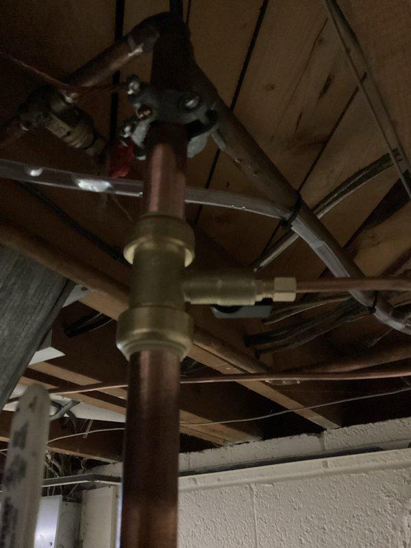 Completed furnace-only installation of 70,000 BTU heating unit with all necessary mechanical permits obtained. Reconnected existing humidifier to new furnace system and verified all gas line connections, venting, and drainage components for proper operation. Pre-installation air conditioning system testing was performed prior to equipment tear-out to ensure existing cooling functionality remained intact.