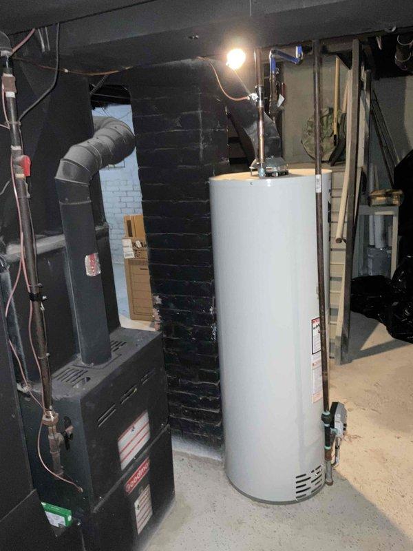 Conducted site assessment for new mini split installation on second floor wall. Evaluated existing HVAC infrastructure in basement mechanical room, documenting current furnace and water heater configuration along with existing ductwork and ventilation routing. Provided additional estimates for chimney liner installation and electrical work as requested.