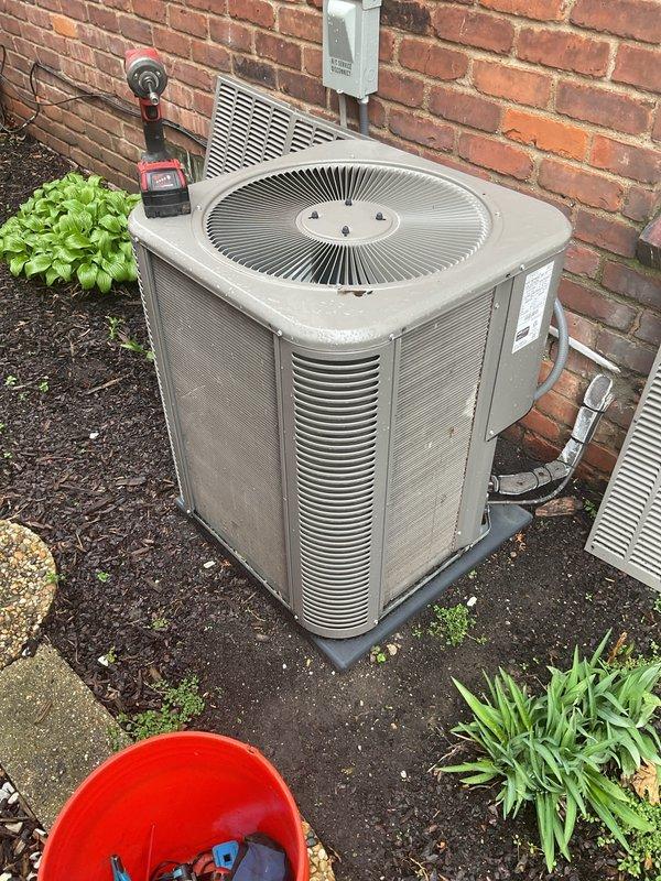 Completed annual HVAC maintenance on residential split system air conditioning unit. Performed comprehensive inspection of outdoor condenser unit and indoor evaporator coil, measuring operating temperatures and verifying proper system function at 68.1°F. Identified air filter requiring replacement and recommended filter change to maintain optimal airflow and system efficiency.