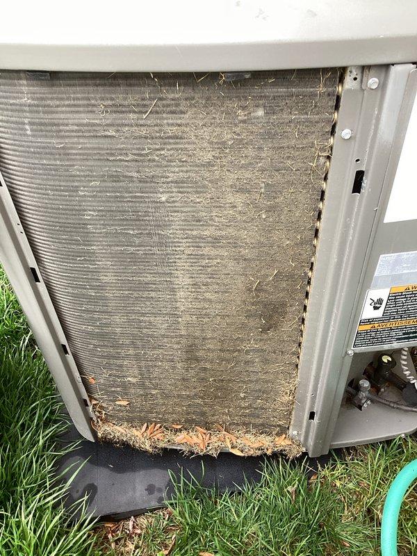 Completed annual cooling maintenance on residential split system. Upon arrival, found condenser coil heavily clogged with dirt, dust, and organic debris, significantly restricting airflow through the fins. Performed thorough coil cleaning to restore proper heat transfer efficiency. Replaced air filter and evaporator pad as needed. Inspected all electrical connections, refrigerant lines, and mechanical components. Unit tested and operating within normal parameters upon completion.