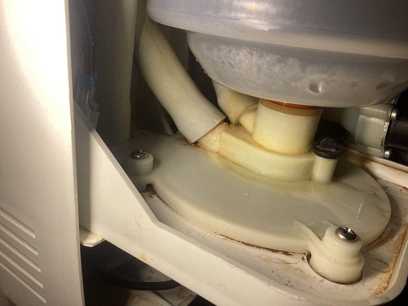 Responded to service call for leaking humidifier canister that was recently installed. Upon inspection, found extensive rust staining and water damage on the mounting platform and surrounding components, confirming active leak from the canister assembly. Replaced defective humidifier canister (part #35-15) and verified proper seal and operation of the system with no further leakage detected.