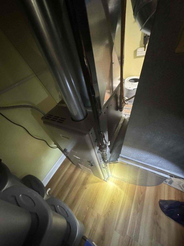 Conducted full system estimate for 16-year-old air conditioning unit requiring immediate replacement. Evaluated existing HVAC equipment and ductwork configuration in basement utility area, documented system condition through photographs, and assessed installation requirements for complete system replacement. Provided comprehensive replacement options and recommendations based on current equipment age and customer's timeline for immediate system changeover.