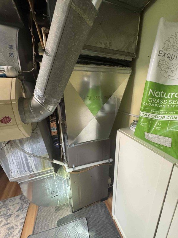 Conducted full system estimate for 16-year-old air conditioning unit requiring immediate replacement. Evaluated existing HVAC equipment and ductwork configuration in basement utility area, documented system condition through photographs, and assessed installation requirements for complete system replacement. Provided comprehensive replacement options and recommendations based on current equipment age and customer's timeline for immediate system changeover.