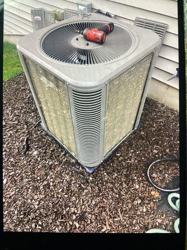 Completed annual cooling maintenance on residential outdoor condenser unit. Performed comprehensive system inspection, cleaned condenser coils, verified proper airflow through louvered panels, checked refrigerant levels, and tested fan operation. Unit operating within normal parameters upon completion of preventive maintenance service.