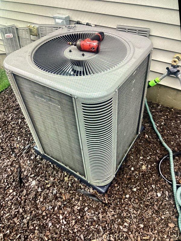 Completed annual cooling maintenance on residential outdoor condenser unit. Performed comprehensive system inspection, cleaned condenser coils, verified proper airflow through louvered panels, checked refrigerant levels, and tested fan operation. Unit operating within normal parameters upon completion of preventive maintenance service.