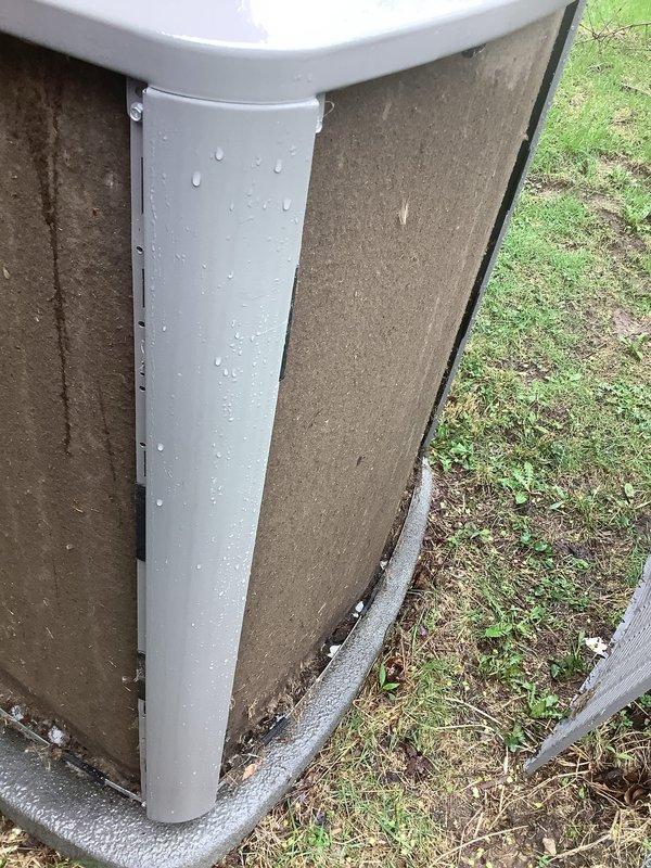 Completed routine Air Care Maintenance on residential air conditioning system. Performed comprehensive inspection of outdoor condenser unit, noting significant dirt and debris accumulation on coil fins requiring attention. Unit exterior showed normal weathering with moisture present from recent precipitation. Documented equipment condition through photographic records showing coil contamination and overall system status. All standard ACM procedures executed per protocol with unit operational at time of service completion.