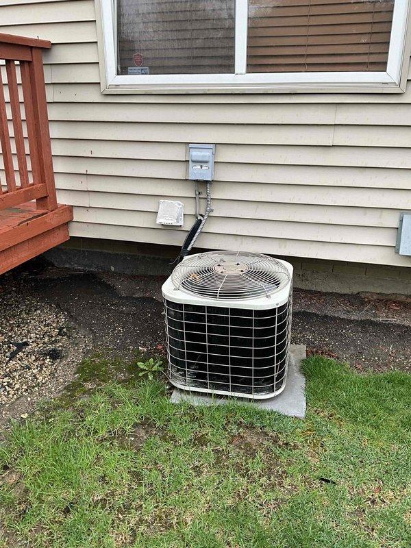 Conducted on-site evaluation for complete HVAC system replacement, assessing existing air conditioning condenser unit mounted on exterior concrete pad and indoor air handler located in basement mechanical room. Documented current equipment conditions, utility connections, and installation specifications to provide comprehensive quote for new furnace and air conditioning system installation.