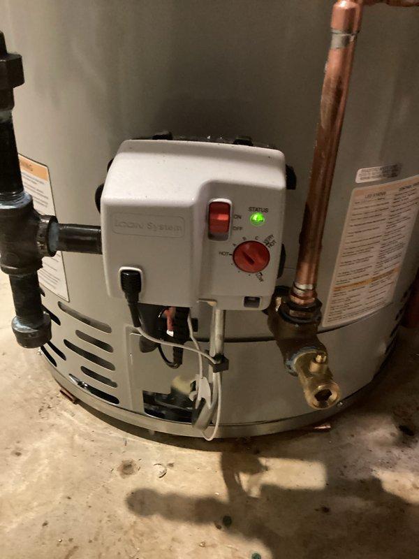 Successfully completed warranty installation of Bradford White automatic storage water heater with all necessary plumbing connections and safety components. Installed thermal expansion tank to protect system from excessive pressure buildup and ensure code compliance. All copper supply lines, brass valve fittings, and control components properly connected and tested for proper operation, with unit mounted securely on concrete pad and all manufacturer specifications verified.