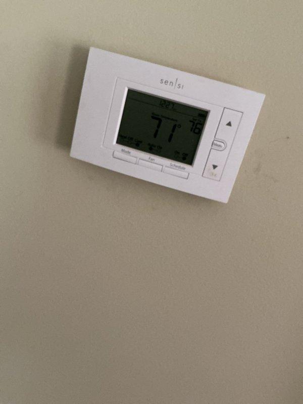 Completed scheduled air conditioning maintenance service including inspection of evaporator coil and air handler system. Verified thermostat operation showing proper temperature display and control functionality, replaced air filter and evaporator pad as part of routine preventive maintenance protocol.