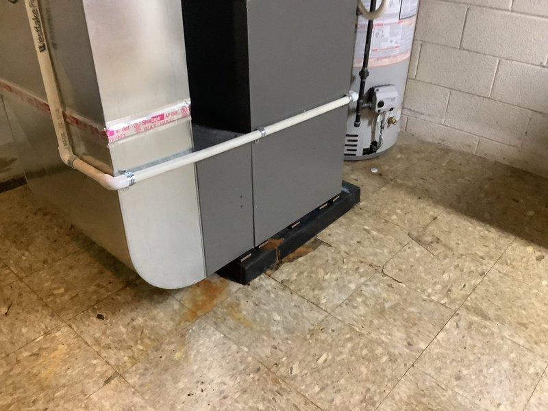 Replaced defective heat exchanger and PCO kit on residential furnace system under warranty coverage. Unit is a Lennox model located in basement utility area with standard PVC condensate drainage configuration. Both components were sourced from Lennox supply house and installed per manufacturer specifications to restore proper heating system operation.