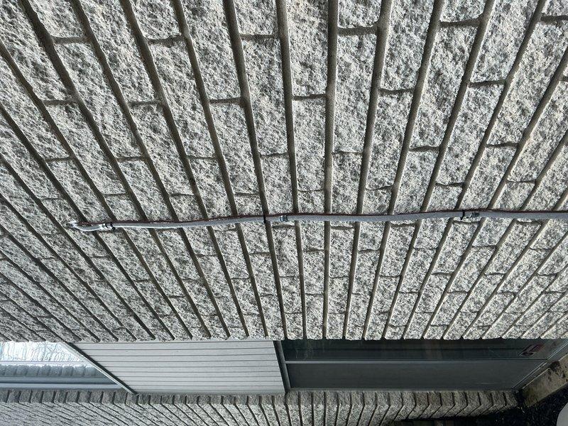 Completed warranty callback to install proper 4-wire communication wiring for new HVAC system. Removed temporary 2-wire setup and ran new 4-conductor thermostat wire from air handler unit located in attic space to thermostat location. Verified proper communication between system components and confirmed 50.5-degree supply air temperature at unit. System now operating correctly with full communicating functionality as designed.