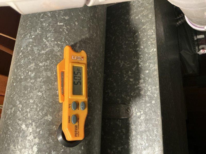 Completed warranty callback to install proper 4-wire communication wiring for new HVAC system. Removed temporary 2-wire setup and ran new 4-conductor thermostat wire from air handler unit located in attic space to thermostat location. Verified proper communication between system components and confirmed 50.5-degree supply air temperature at unit. System now operating correctly with full communicating functionality as designed.